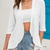 White Hole Half Sleeve Asymmetric Hem Blouse